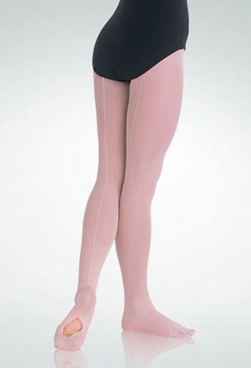 A dancer in a black leotard poses in Body Wrappers Back-Seam Tights—light pink with a back seam and a heel opening that shows part of the foot—against a plain, light background.