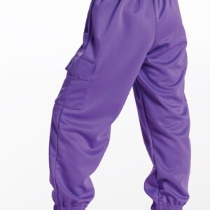 A person wearing Weissman Parachute Pants in purple with side pockets and elastic ankle cuffs, paired with white sneakers, stands against a white background.