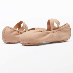 A pair of Weissman 4-Way Stretch Split Sole Ballet Shoes in light pink with elastic straps, shown on a white background; one upright and one tilted to highlight their soft, flexible material and simple design.