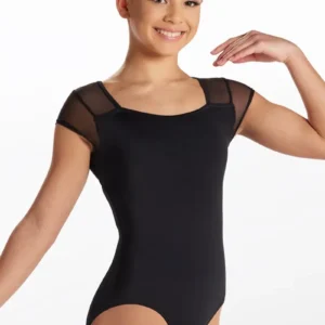 A young woman poses with one arm raised, wearing the Mesh Cap Sleeve Leotard, featuring sheer cap sleeves, against a plain white background.